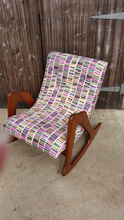 Purple and while paneled rocking chair