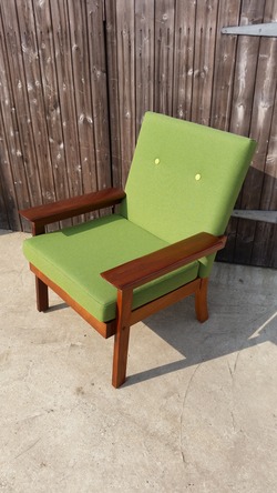 Single green armchair