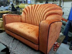 Two seater orange sofa